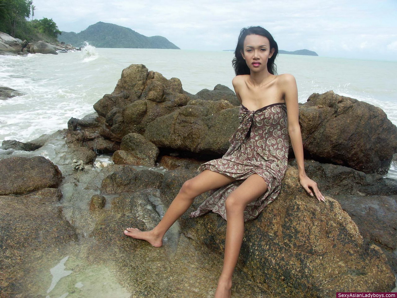 Slim Busty Ladyboy - Hot and busty Thai ladyboy skinny dipping on a Phuket's beach